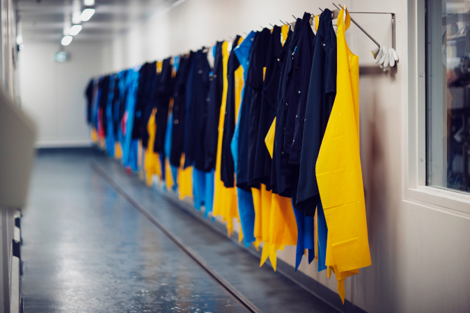 Smocks and aprons in hallway